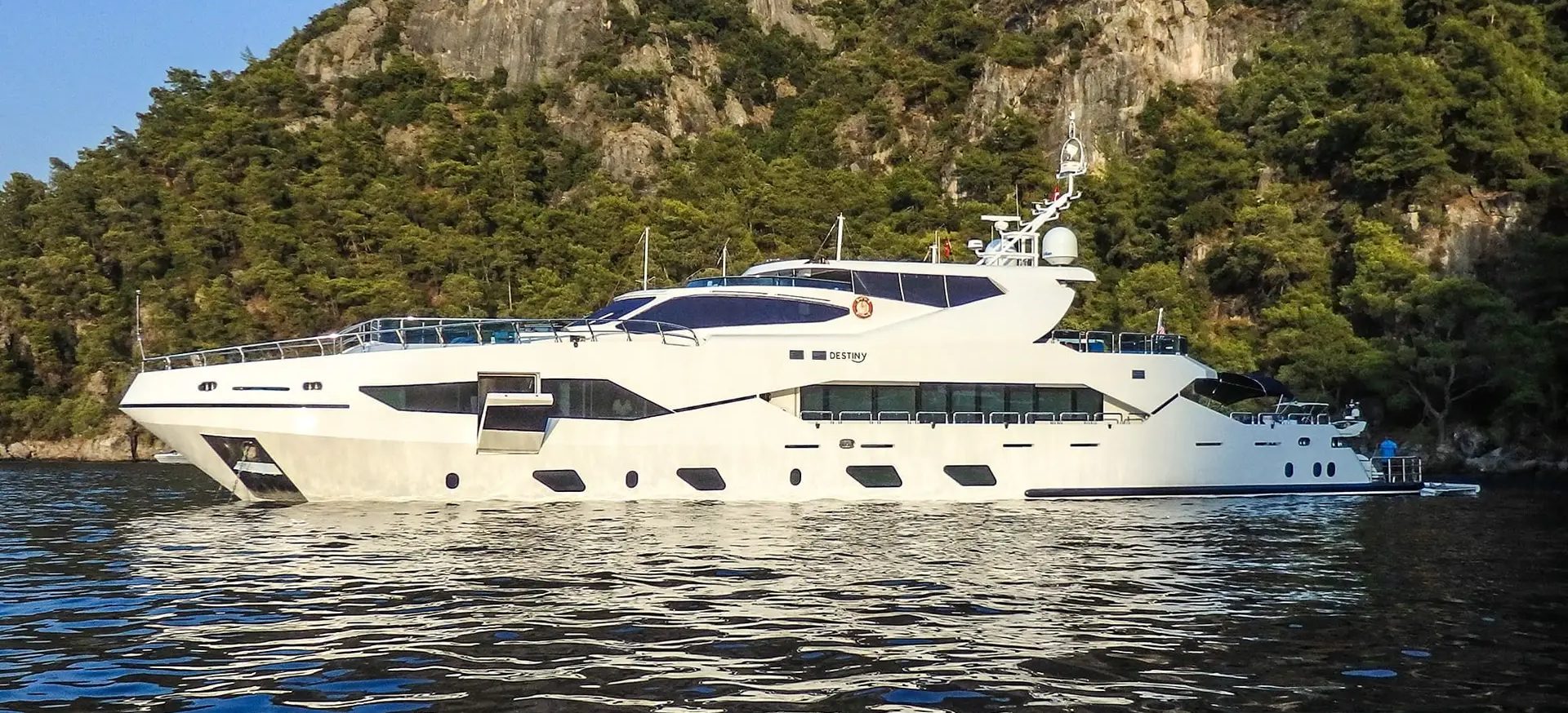 M/Y DESTINY at anchor, full exterior profile view from the water